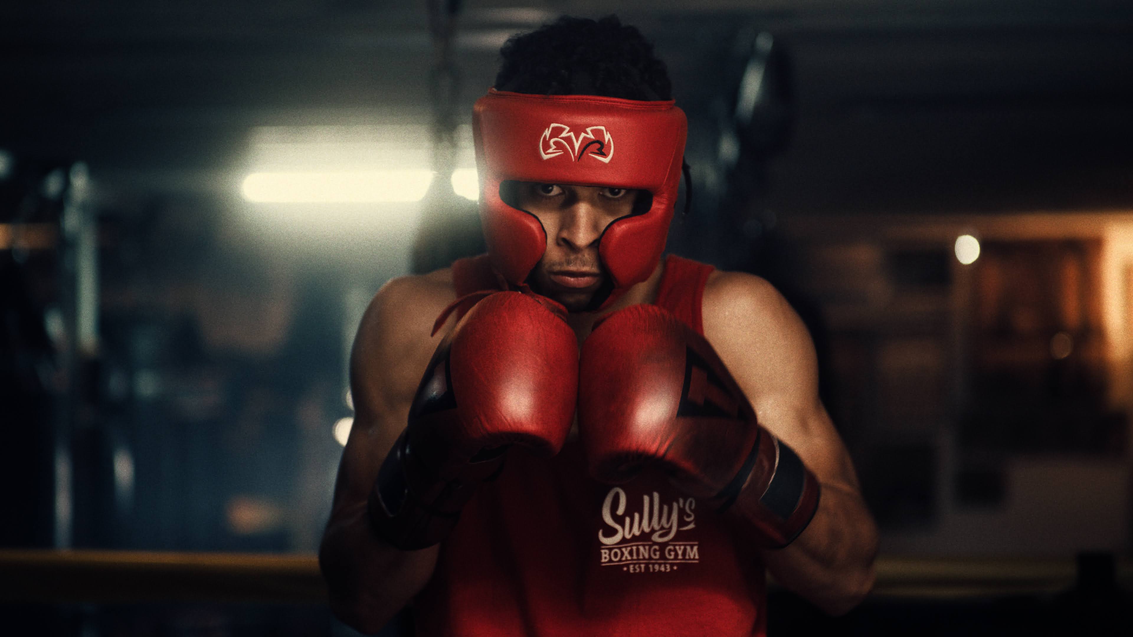 Boxer in red headgear